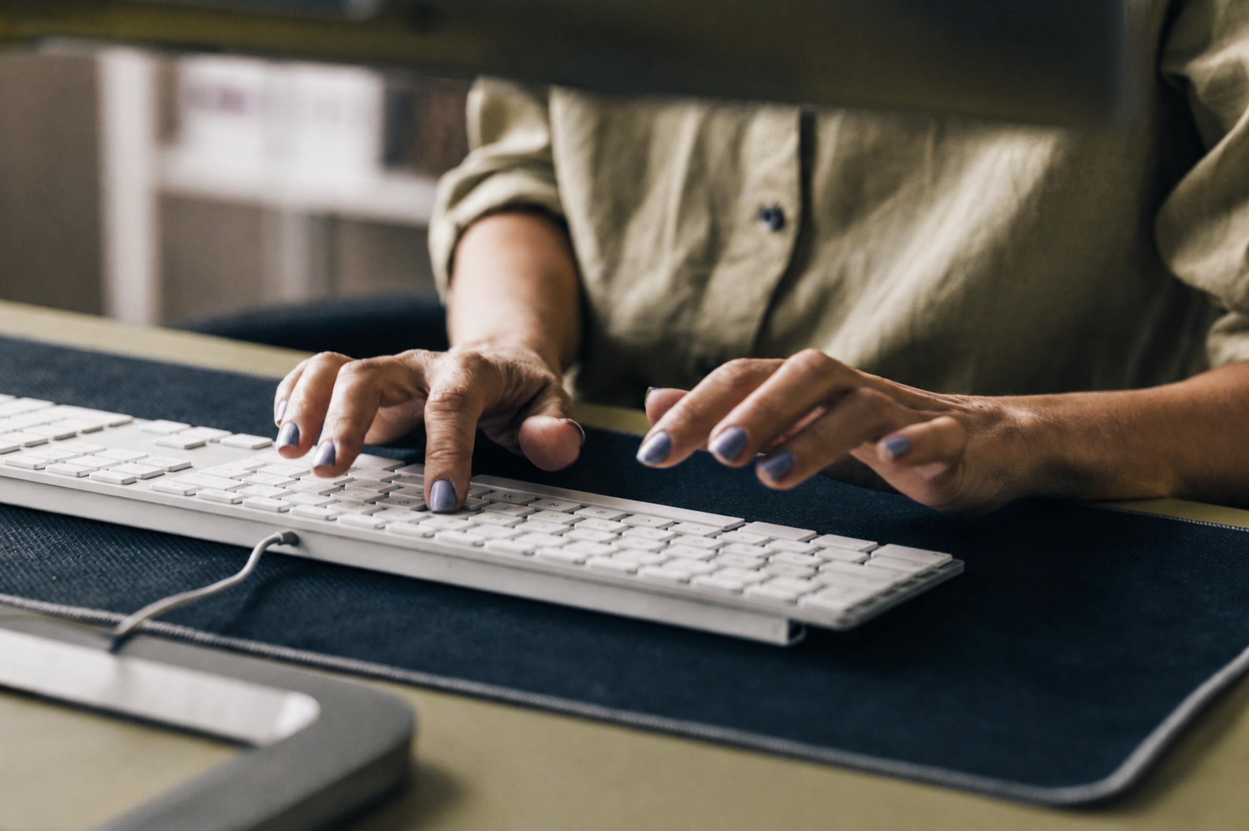 A VA works at a computer